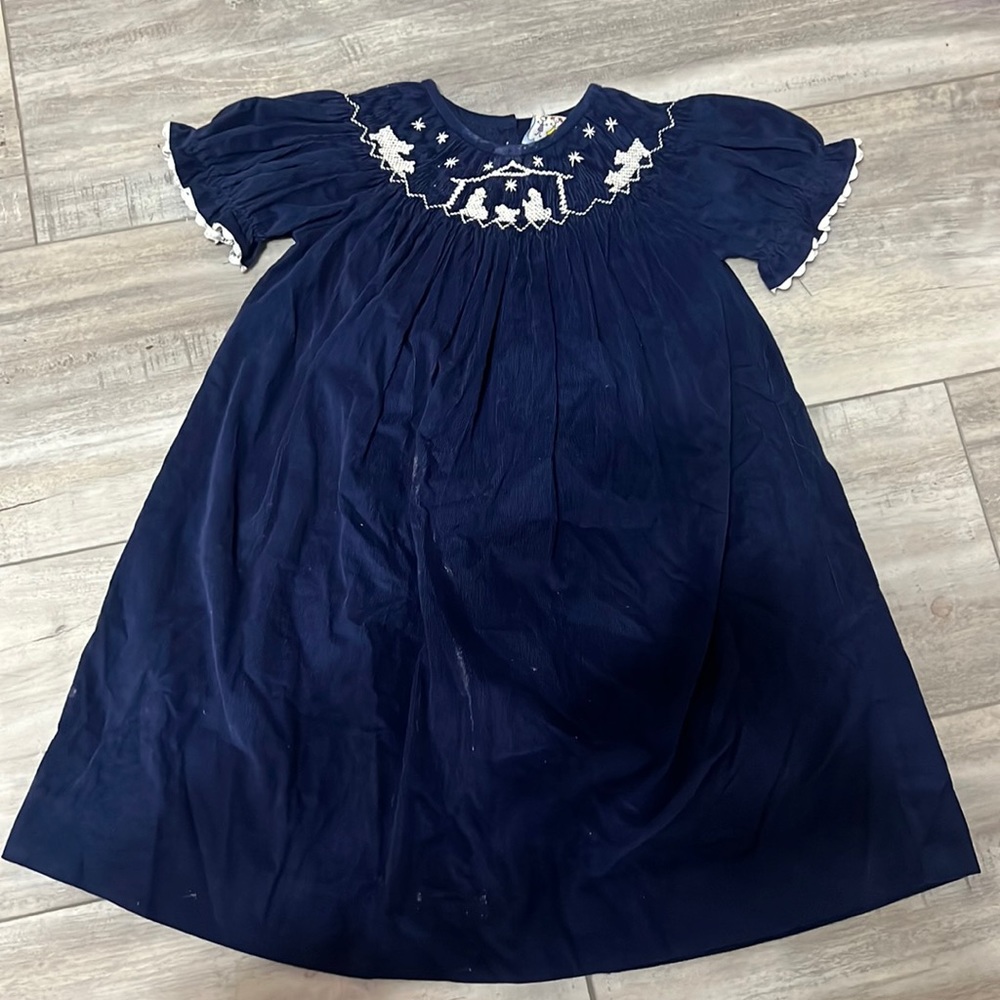 Velvet threes sister smocked dress with nativity scene around collar
